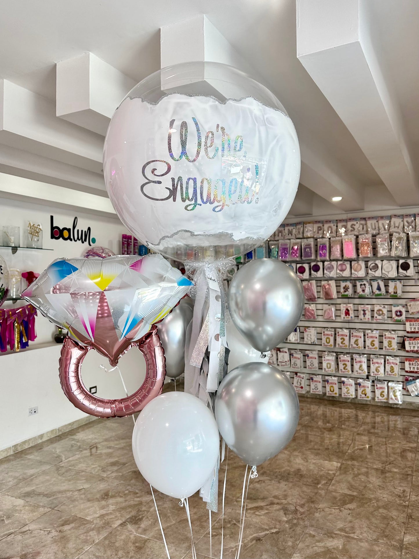 Globo Burbuja + Diamantina + 1 Anillo Chico Rose Gold + 5 Globos Látex